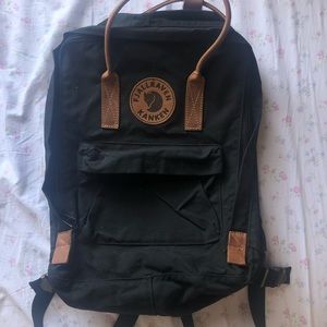 black and brown “leather” accented Kanken backpack